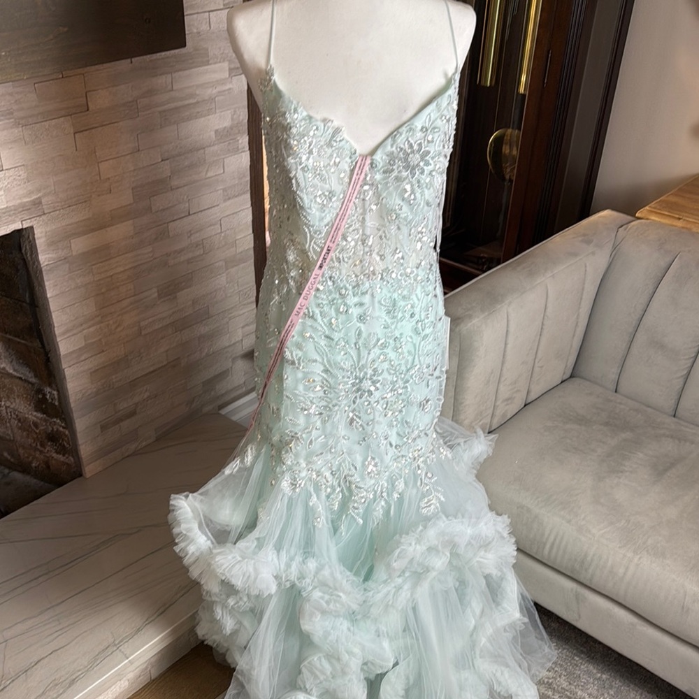 Elegant Mint Green Gown with Embellishments